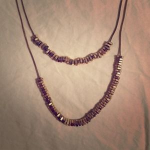 Long gold necklace