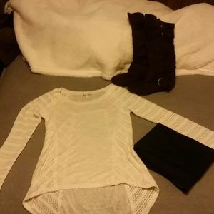 Cute creamed color knit shirt. New with out tags!