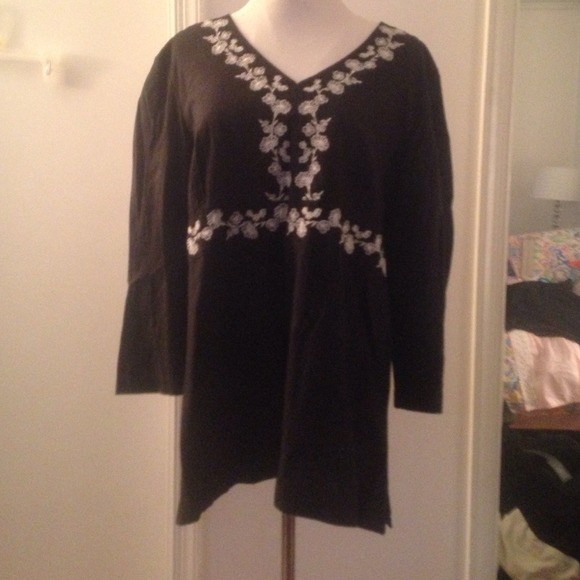 Black tunic with white design.