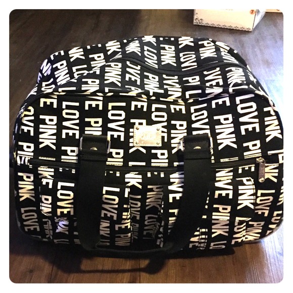 Victoria's Secret Pink black & white roll suitcase