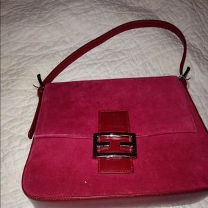Red suede purse.