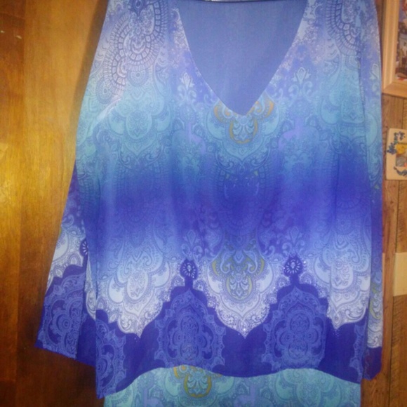 A 2xl long sleeve sheer blouse