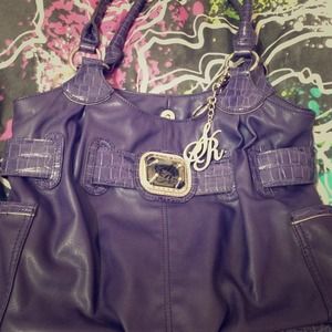 A sienna ricchi purple bag