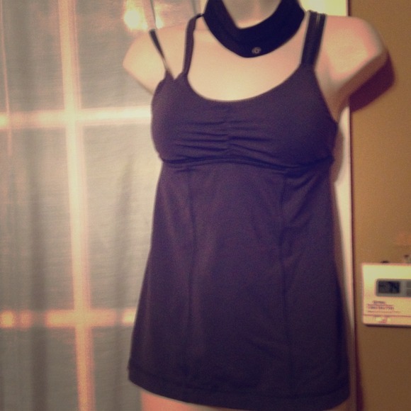 gray yoga top and a headband black