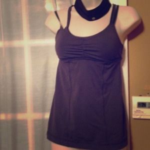 gray yoga top and a headband black