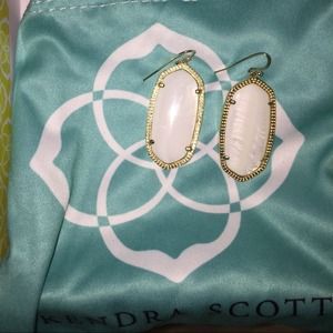 Pearl white Kendra Scott earrings.
