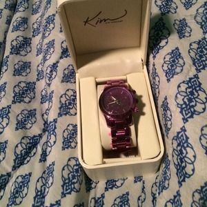 Kim Rogers purple watch.