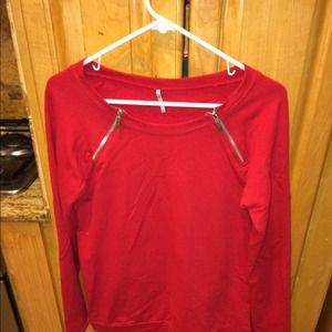 A red & Silver sweater....