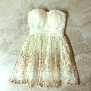 This dress was worn one time.