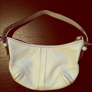 Small white leather Coach bag.