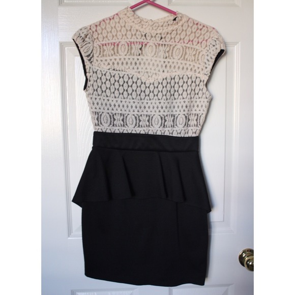 Lovely black and cream lace peplum dress!