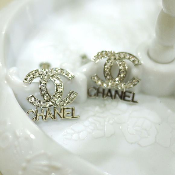Jewelry - Designer logo earrings with brand underneath