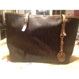 Medium sized brown MK purse