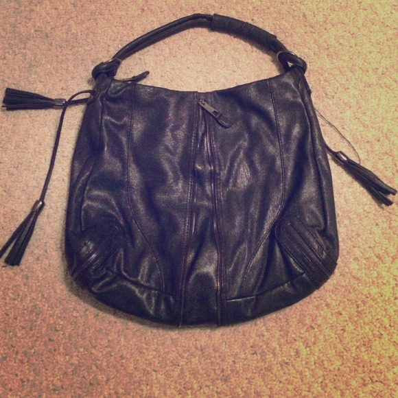 Black purse with tassels