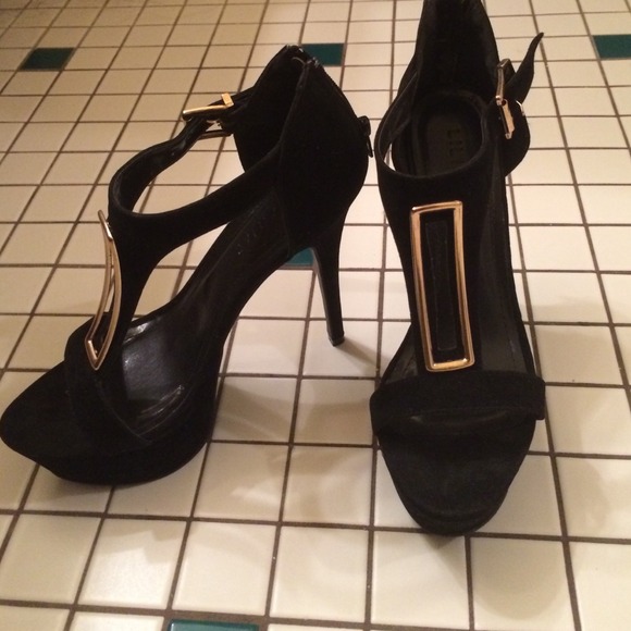 Sexy black and gold platform stilettos