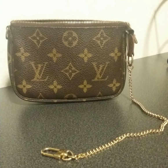 SOLD! Authentic Louis Vuitton mini pochette.