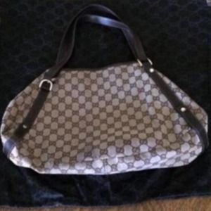 Monogrammed Gucci purse