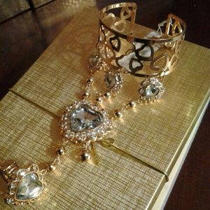 Crystal heart cuff with attached ring