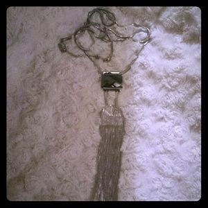 Statement necklace with silver fringe.
