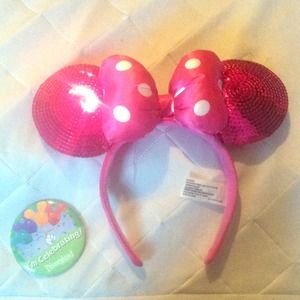 Pink Minnie mouse ears headband and Disneyland pin