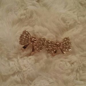 Rose gold bows with glistening rhinestones