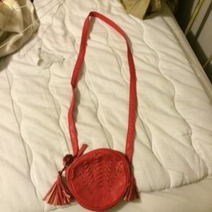 Red satchel with gold details