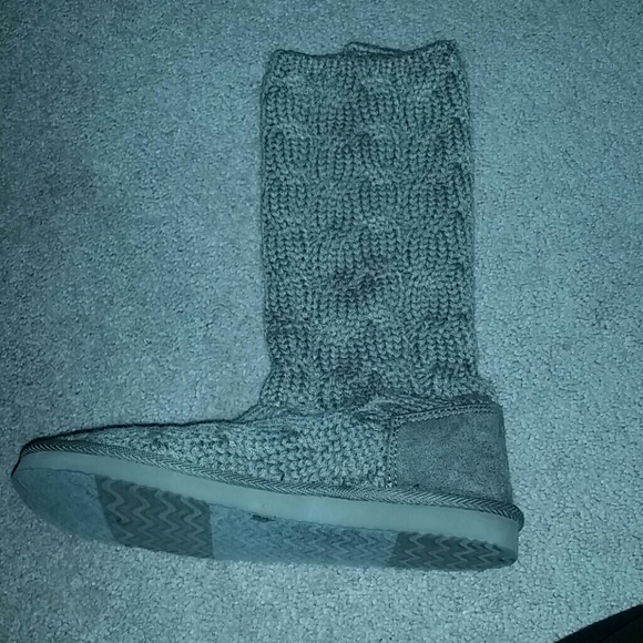 Cable knit sweater boots.