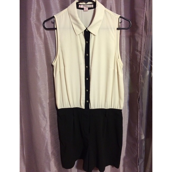 Black and ivory romper suit.