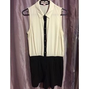 Black and ivory romper suit.