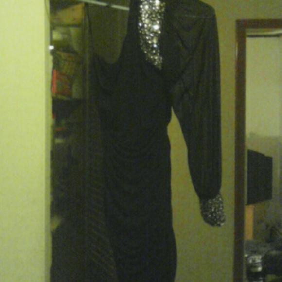 Black onesleeve dress with rhinestone accents