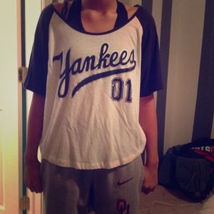 A pink new york yankees shirt