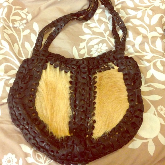 Black leather bag with calf hair
