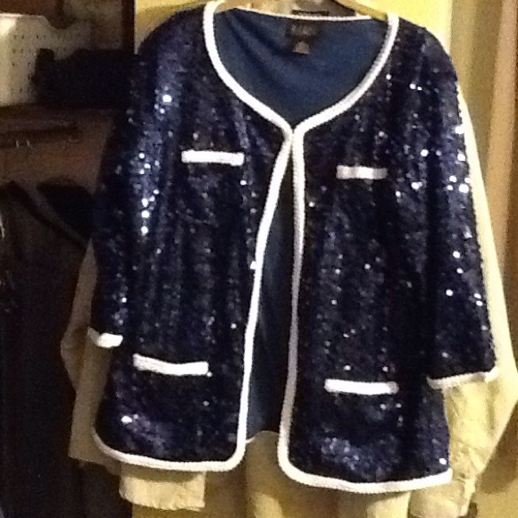 Iman sequined jacket navy blue with white trim.