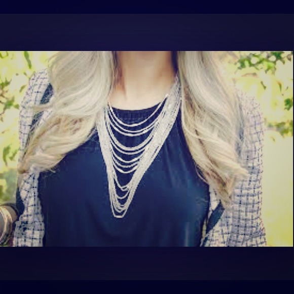 Silver multi strand bib necklace with pave clasp