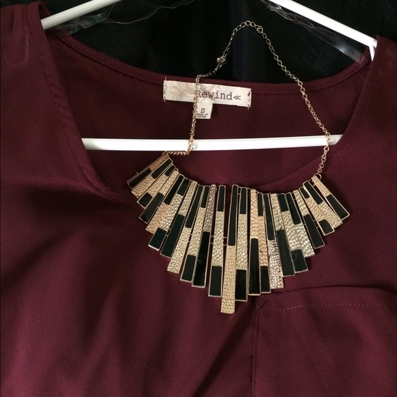 Burgundy shirt and necklace