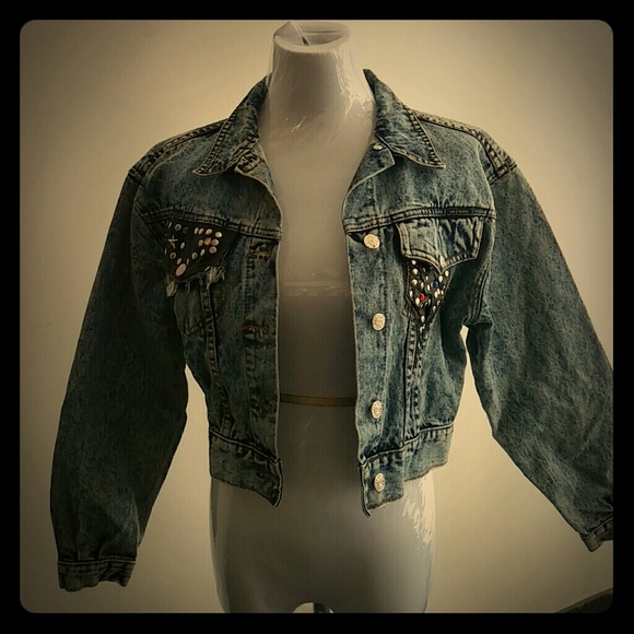 Demin Jacket with studs and colored stones .