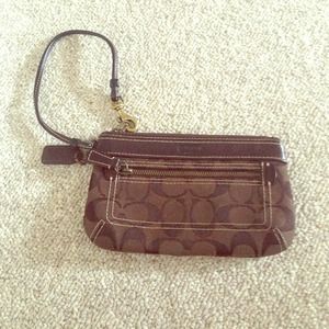 Brown signature coach wristlet