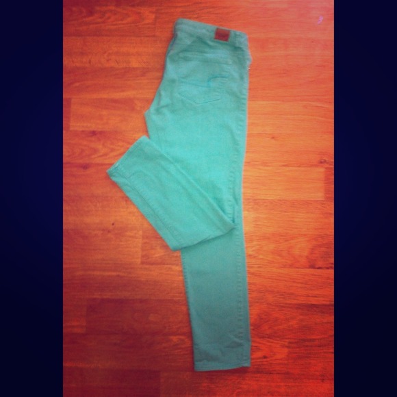 American Eagle skinny turquoise jeans