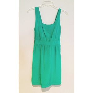 Flattering green dress with open back