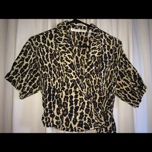 Adorable animal print cross-over/and tie crop top