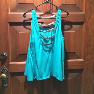 Tank top with striped back. Runs small