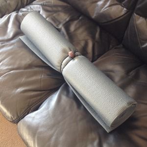 Yoga mat with strap