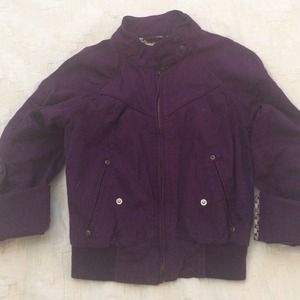 Purple jacket with snap over collar
