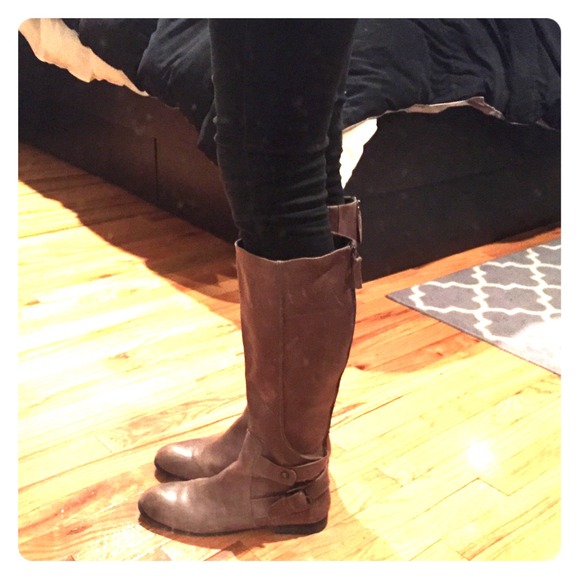 Tall brown riding boots