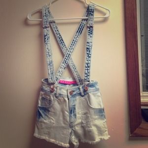 Ripped light wash overalls