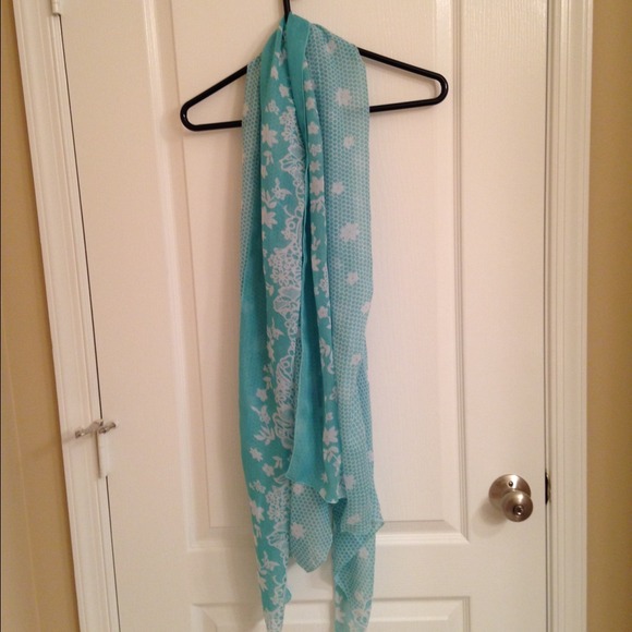 Sold in bundle. Flowery teal scarf.