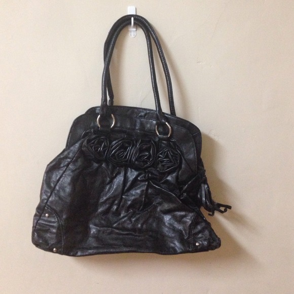 Black purse with 4 flower designs