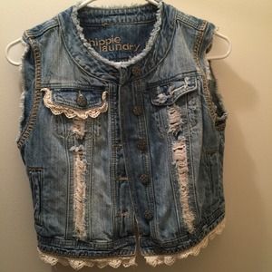 Distressed denim vest with crochet lace trim
