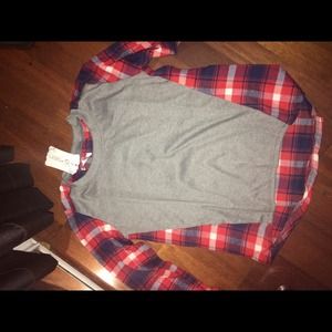 Red, grey, and blue checkered shirt