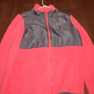 Vibrant salmon color "north face" jacket